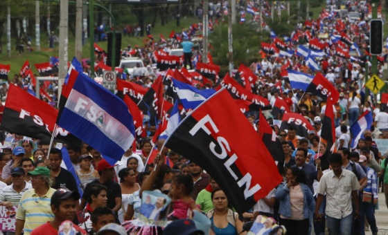 Nicaraguans march for peace and in support of the FSLN government
